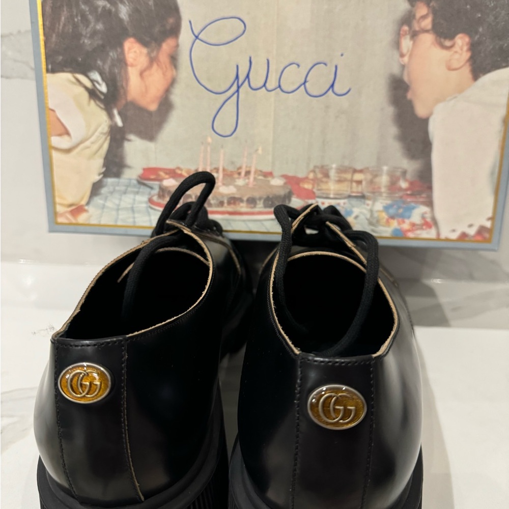 Gucci Black Leather Oxfords with Gold Accents